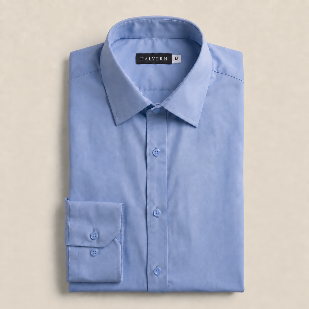 Folded Halvern Glatt light-blue shirt with Halvern label